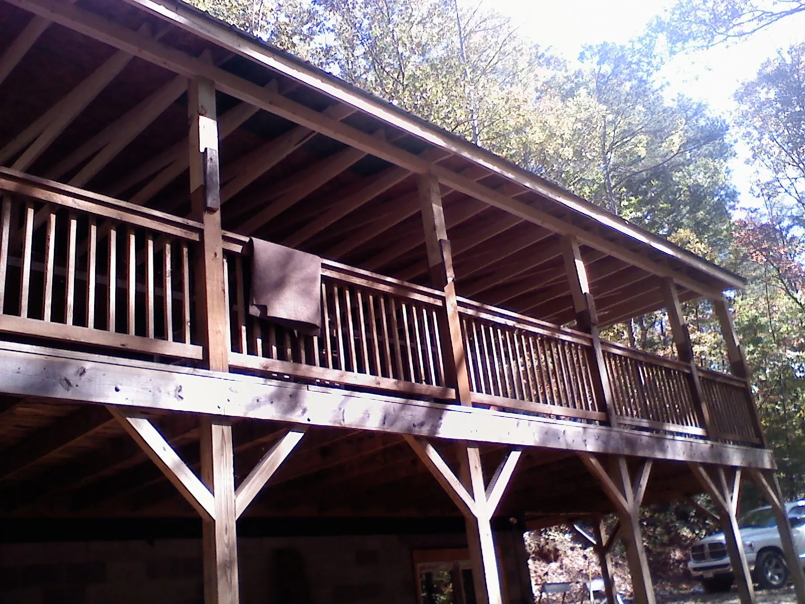 Timber framing under a new elevated porch and deck — Roof Leak Repair in Lefor by Roofing Brothers